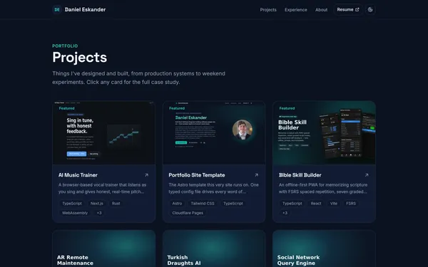 The projects index: a responsive card grid with cover art and tech chips